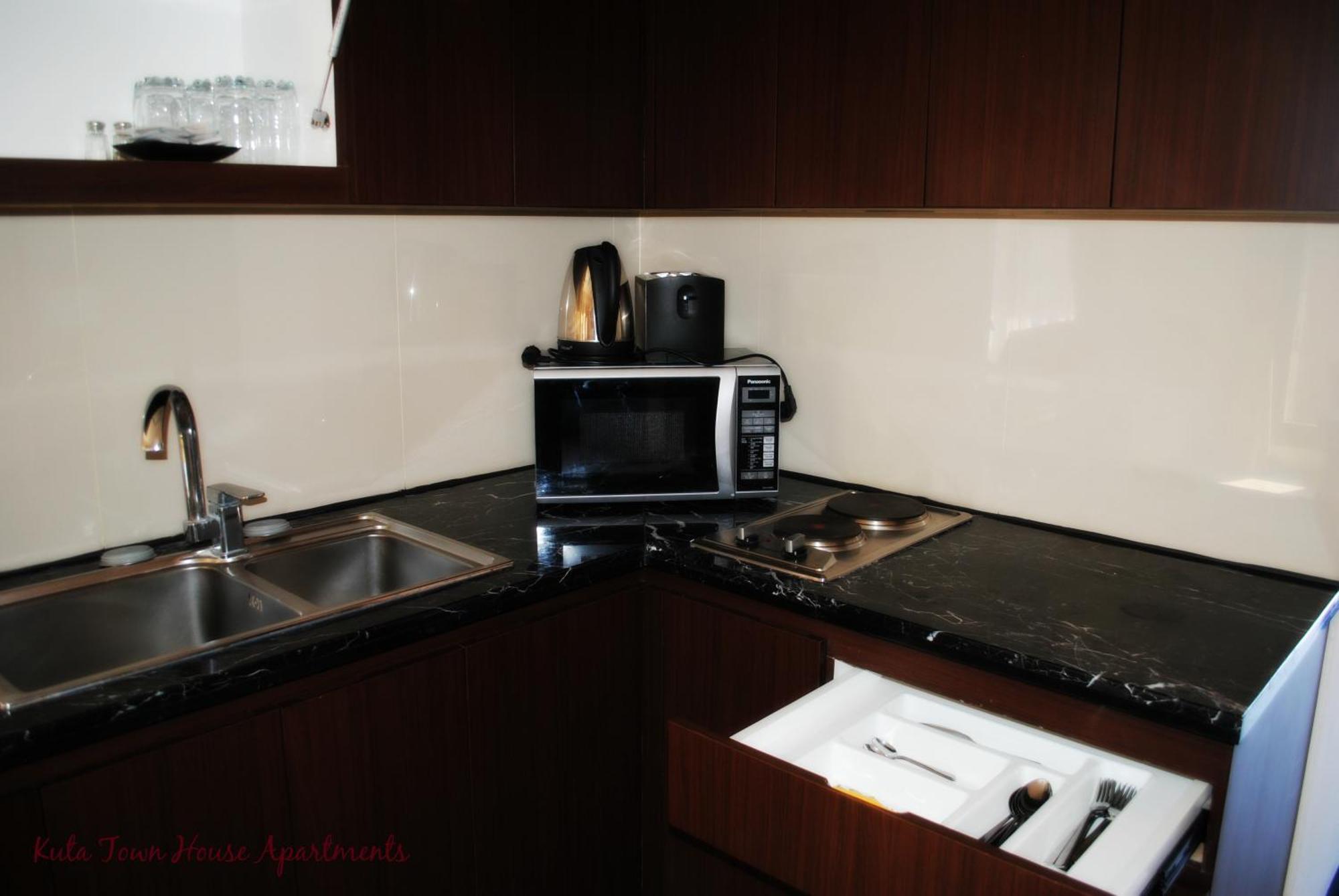 Kuta Town House Apartments Номер фото
